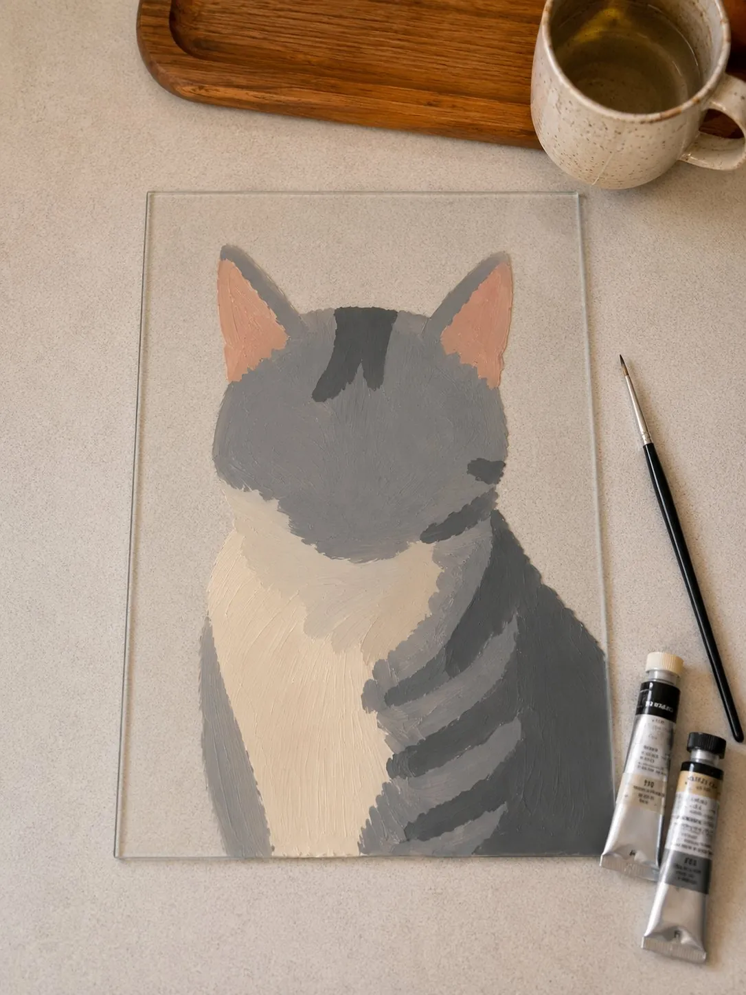 The cat filled in with flat blocks of color, no detail yet
